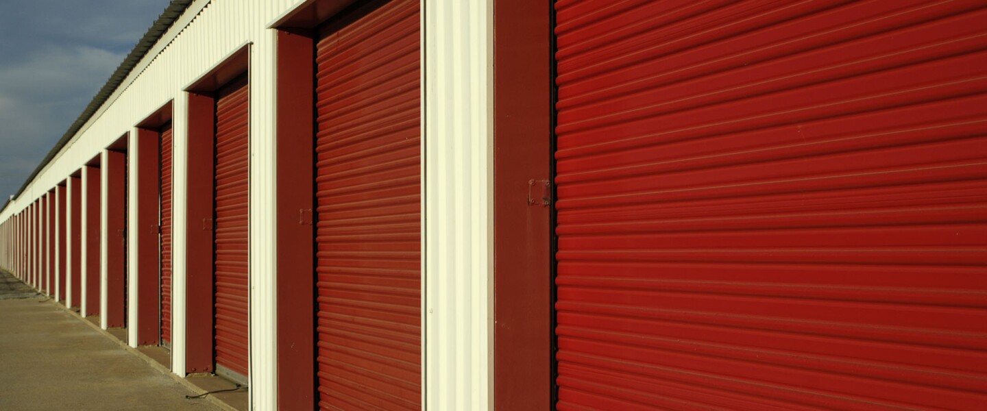 Red storage doors in a straight line 